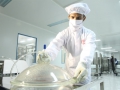 technician in mask in lab